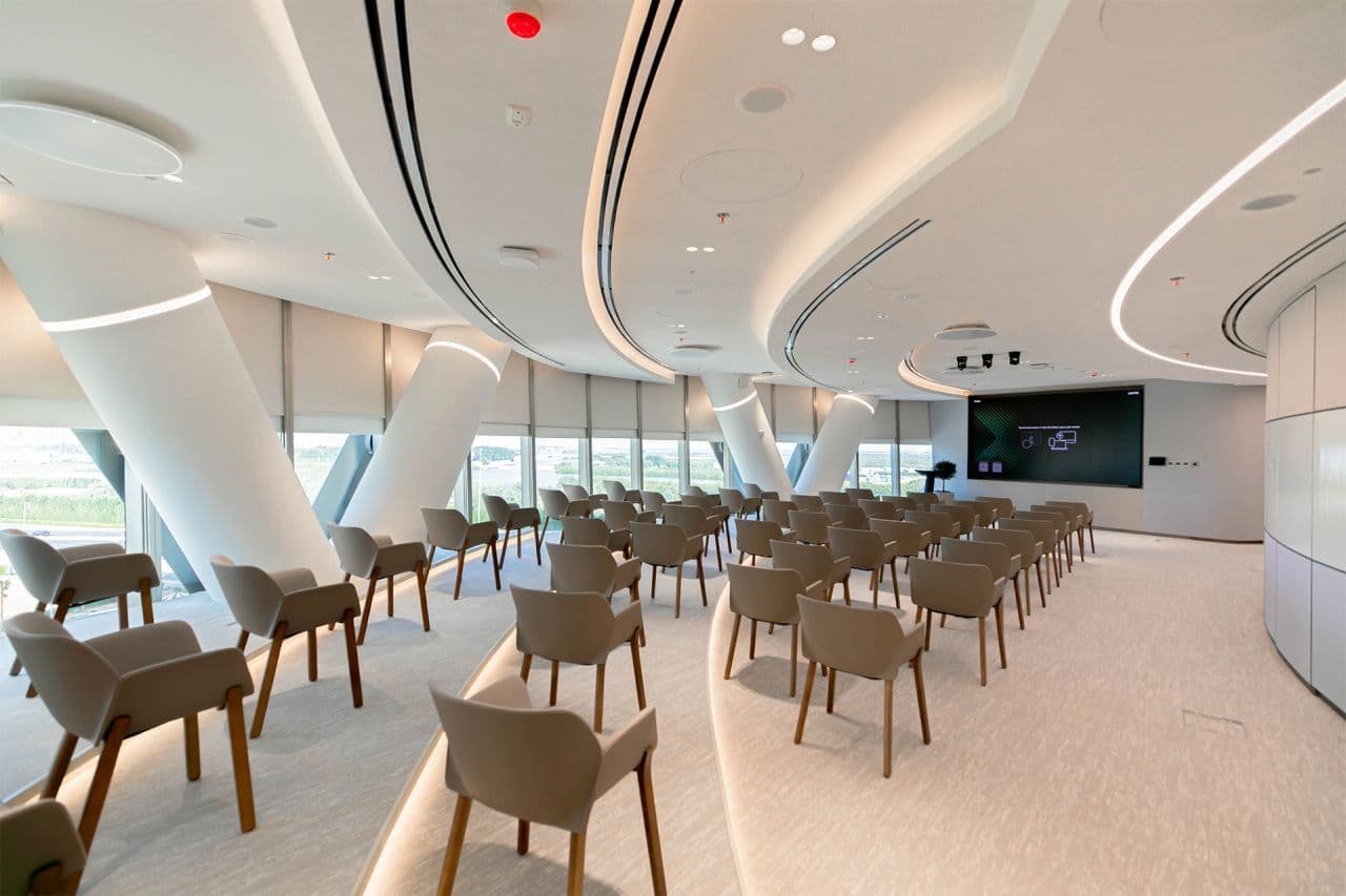 Abu Dhabi Investment Council (ADIC) headquarters, where workplace design integrates acoustic performance to support collaboration, productivity and employee wellbeing.