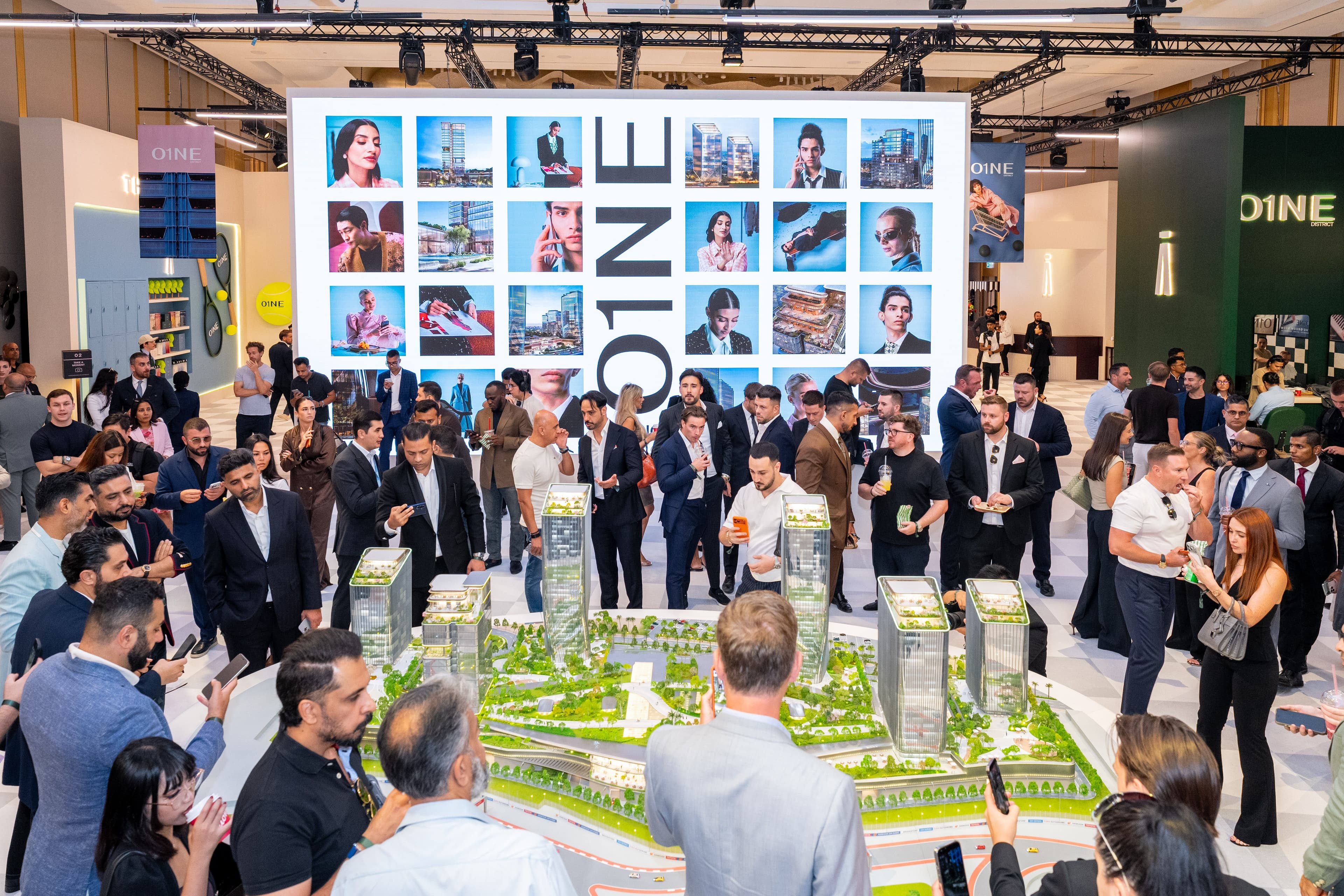 Representatives from AVENEW Development and KORA Properties at the launch of O1NE District in Dubai's Motor City.