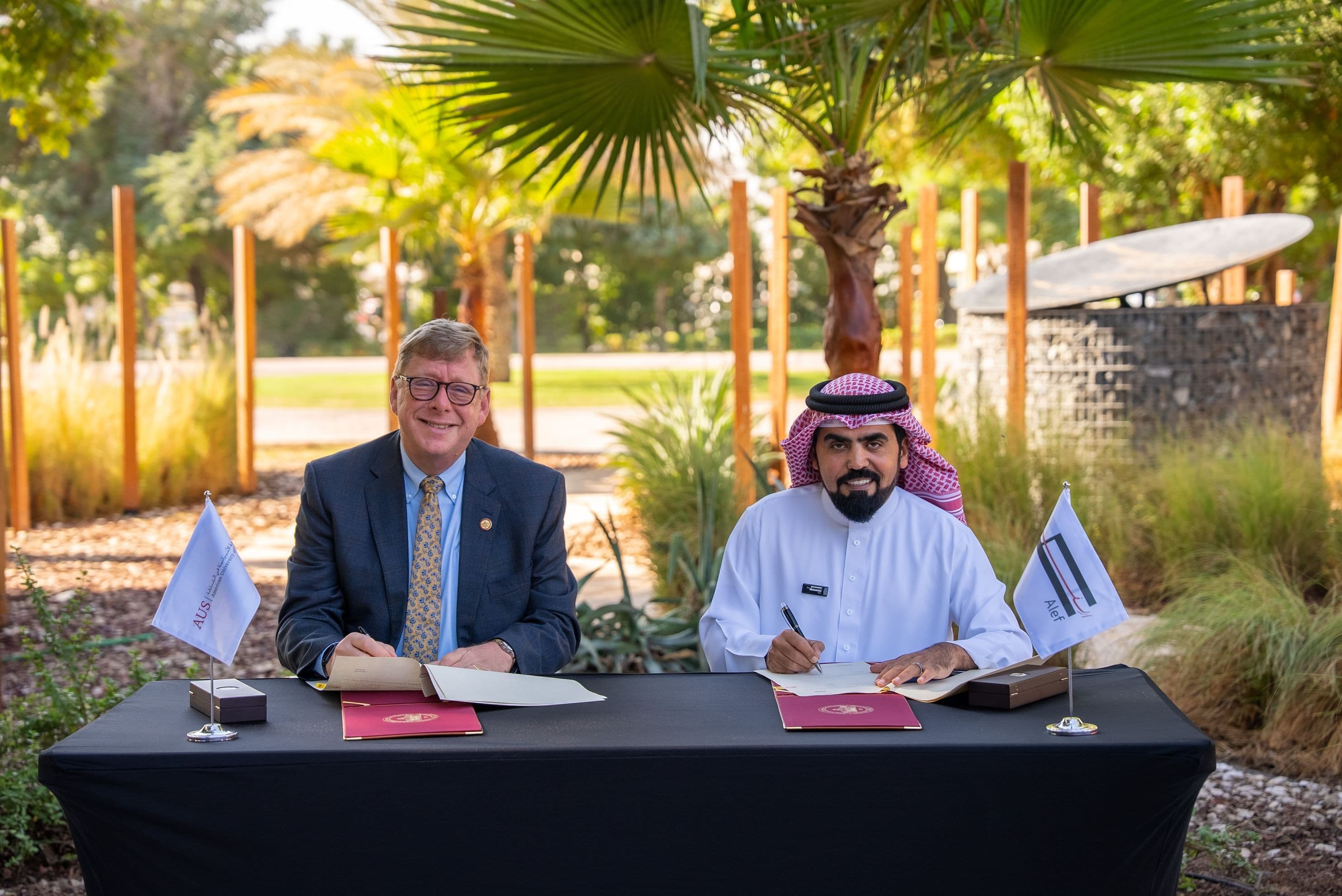 Dr. Tod A. Laursen, Chancellor of AUS and Raed Kajoor Al Nuaimi, CEO of Alef Group at the scholarship agreement signing ceremony.