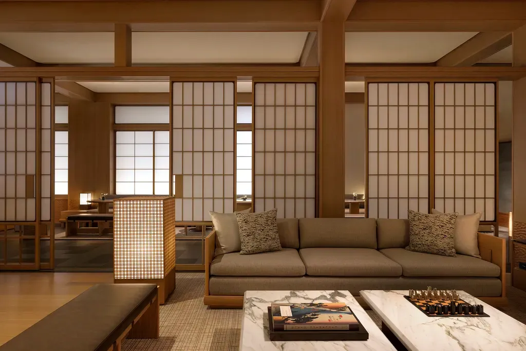 Capella Kyoto Hotel by Kengo Kuma & Associates draws on Kyoto’s machiya heritage through layered timber, filtered light and intimate spatial transitions.