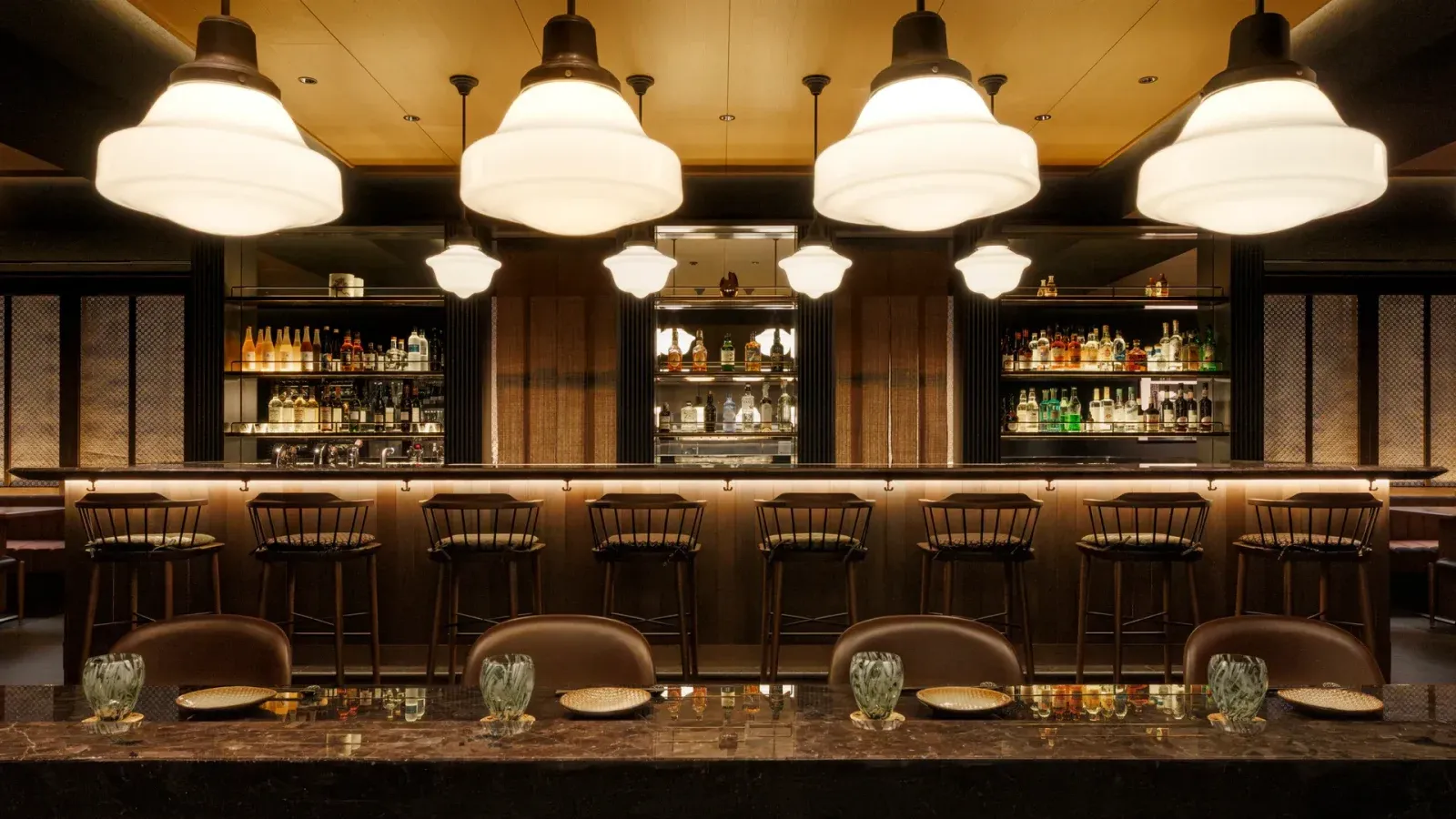 Capella Kyoto Hotel by Kengo Kuma & Associates draws on Kyoto’s machiya heritage through layered timber, filtered light and intimate spatial transitions.