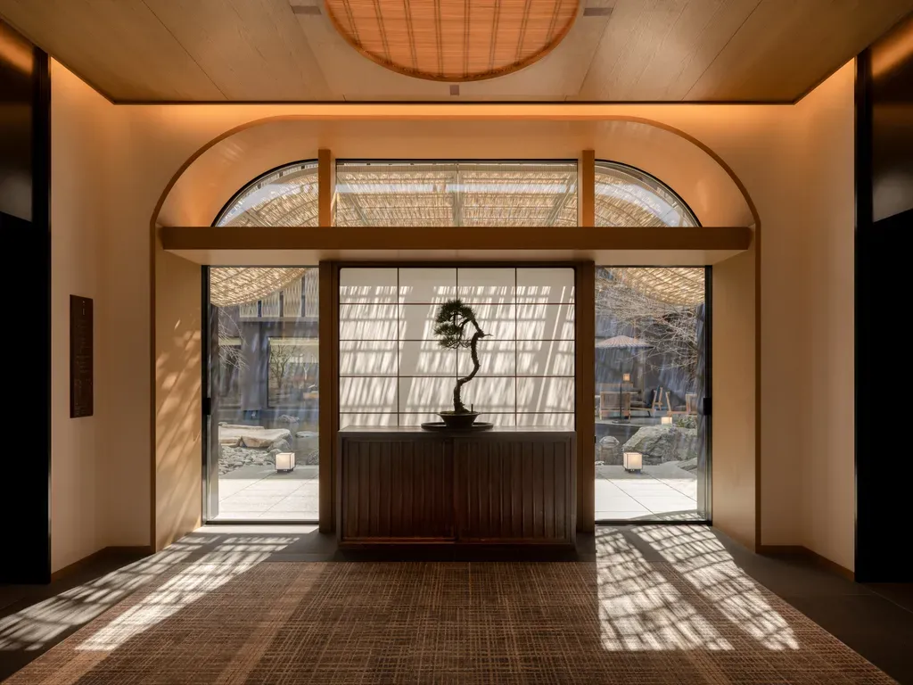 Capella Kyoto Hotel by Kengo Kuma & Associates draws on Kyoto’s machiya heritage through layered timber, filtered light and intimate spatial transitions.