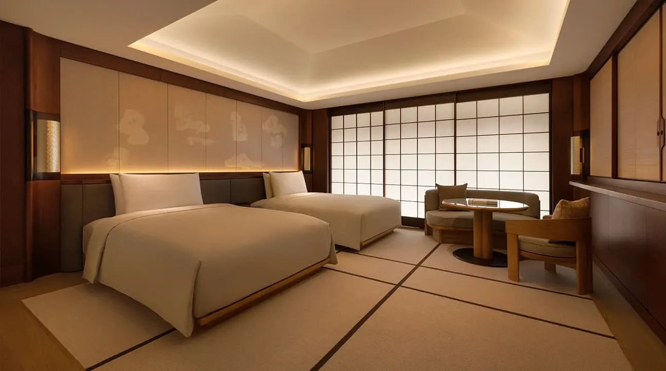 Capella Kyoto Hotel by Kengo Kuma & Associates draws on Kyoto’s machiya heritage through layered timber, filtered light and intimate spatial transitions.