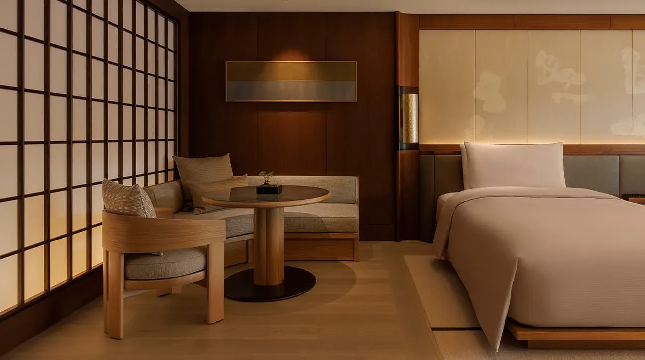 Capella Kyoto Hotel by Kengo Kuma & Associates draws on Kyoto’s machiya heritage through layered timber, filtered light and intimate spatial transitions.
