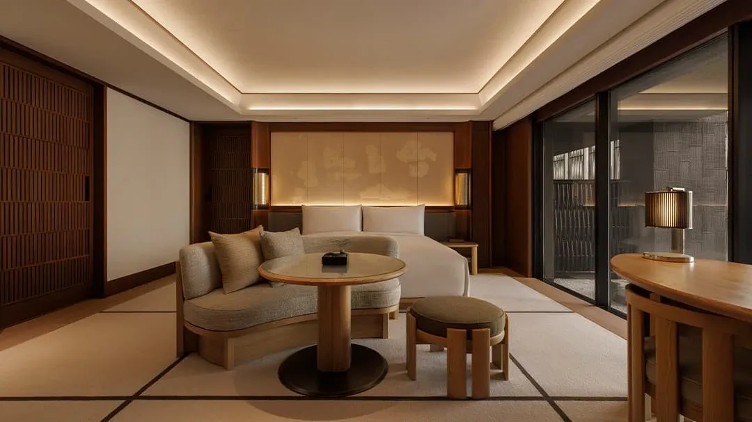 Capella Kyoto Hotel by Kengo Kuma & Associates draws on Kyoto’s machiya heritage through layered timber, filtered light and intimate spatial transitions.