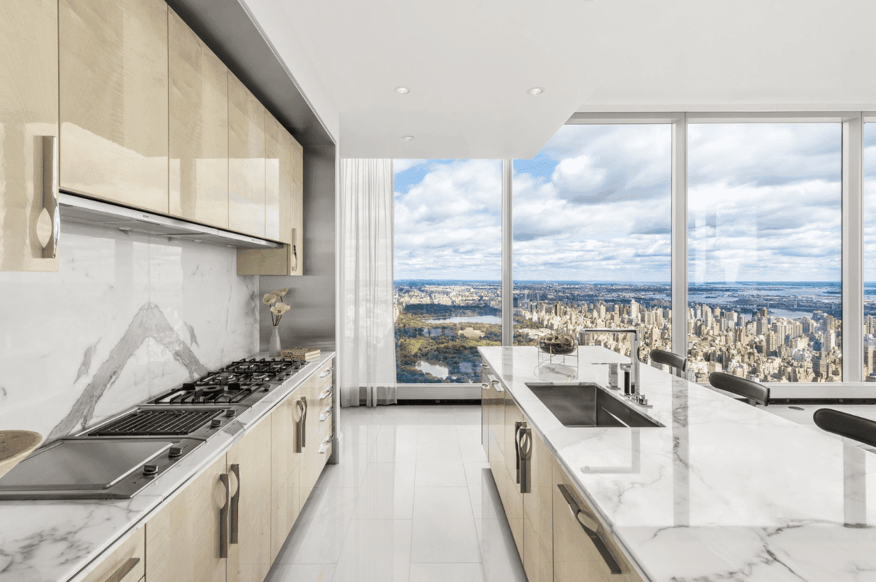 Kitchens feature bespoke Smallbone cabinetry paired with Miele appliances