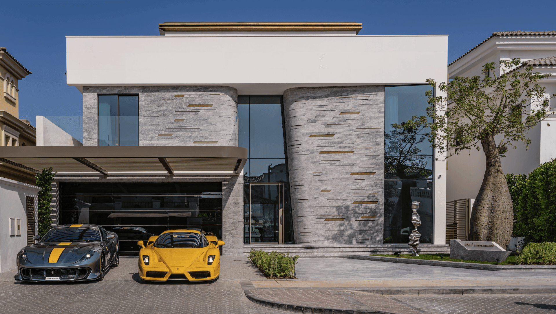 With a price of USD 25.9m, Curve DiLusso offers residents a reclusive oasis on the Palm Jumeirah including one super master bedroom, two master bedrooms, two guest suites, a private cinema, gym, swimming pool and more.