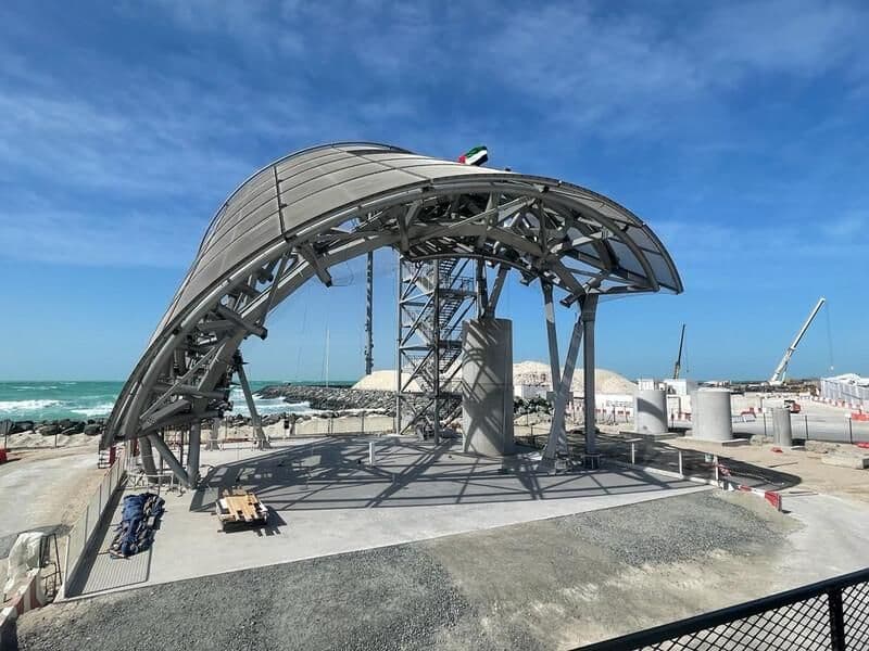 One of the museum’s curved steel structures under construction beside the waterfront.