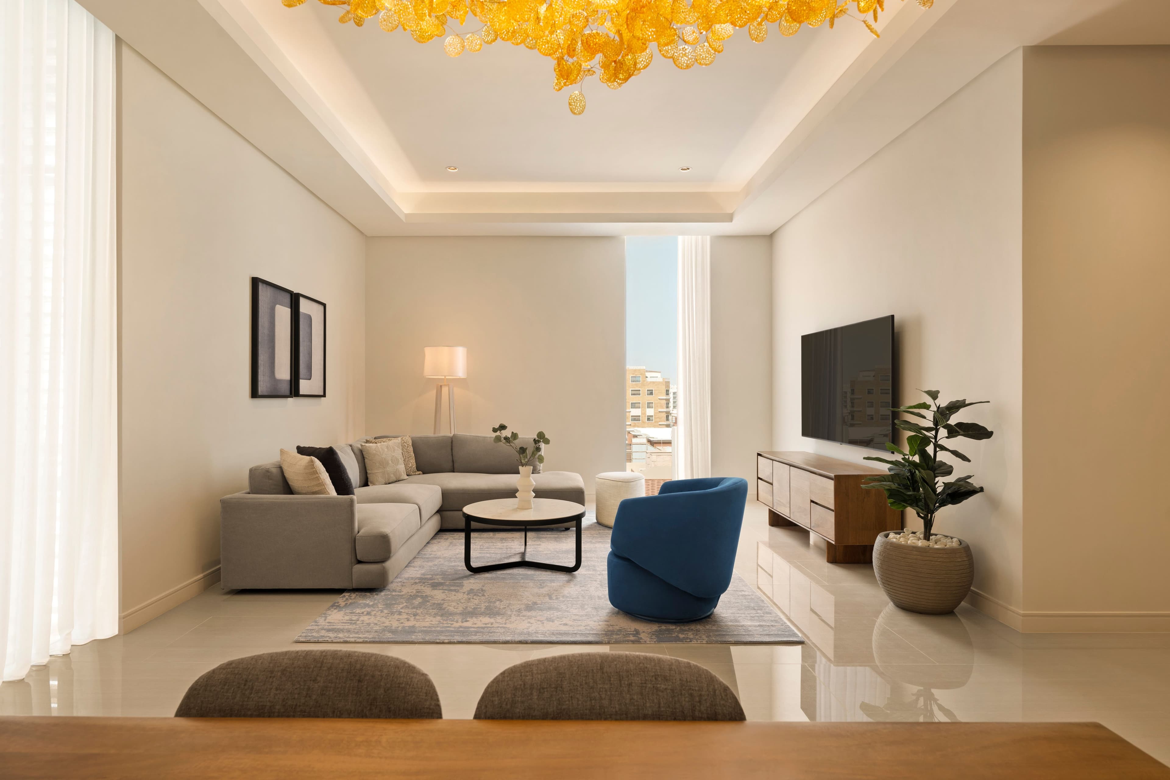 Living room of a three-bedroom apartment at Lifestyle Living Al Salam Jeddah, Apartments by Marriott Bonvoy.