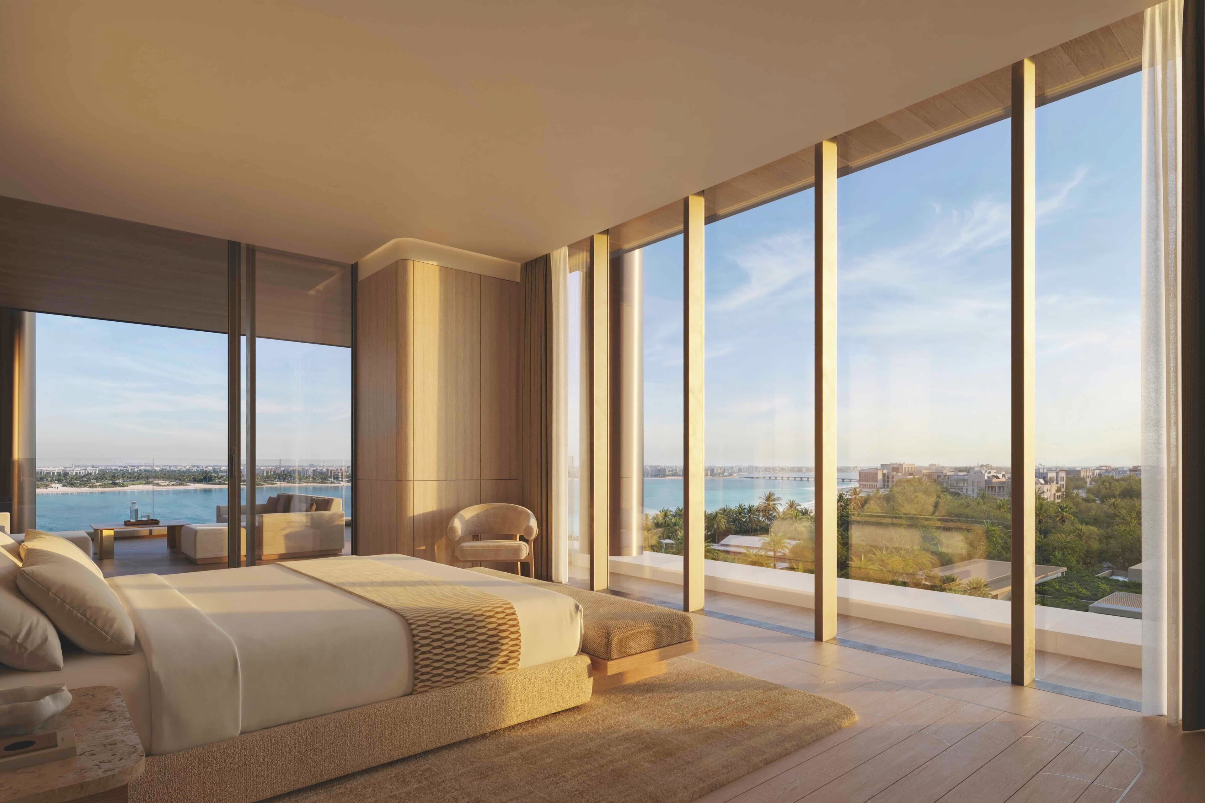 Warm interiors and expansive glazing feature in the proposed Janu residences, where homes will range from 197-square-metre one-bedroom apartments to a 1,761-square-metre five-bedroom penthouse.