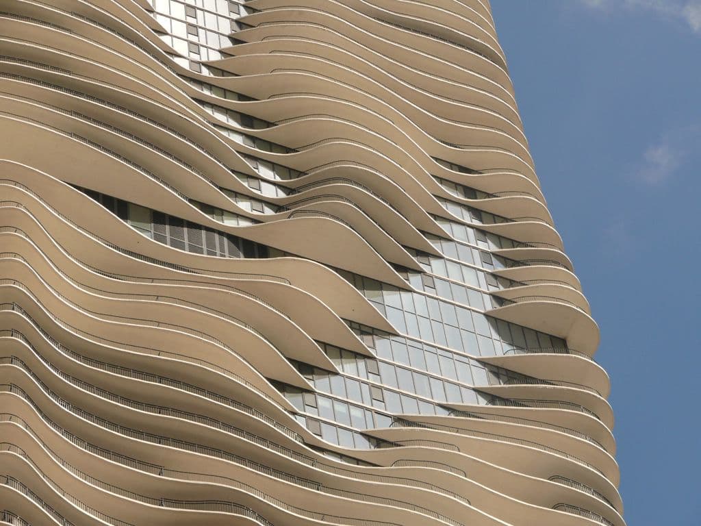 Aqua Tower in Chicago, designed by Studio Gang, is distinguished by its undulating balconies across 82 storeys.