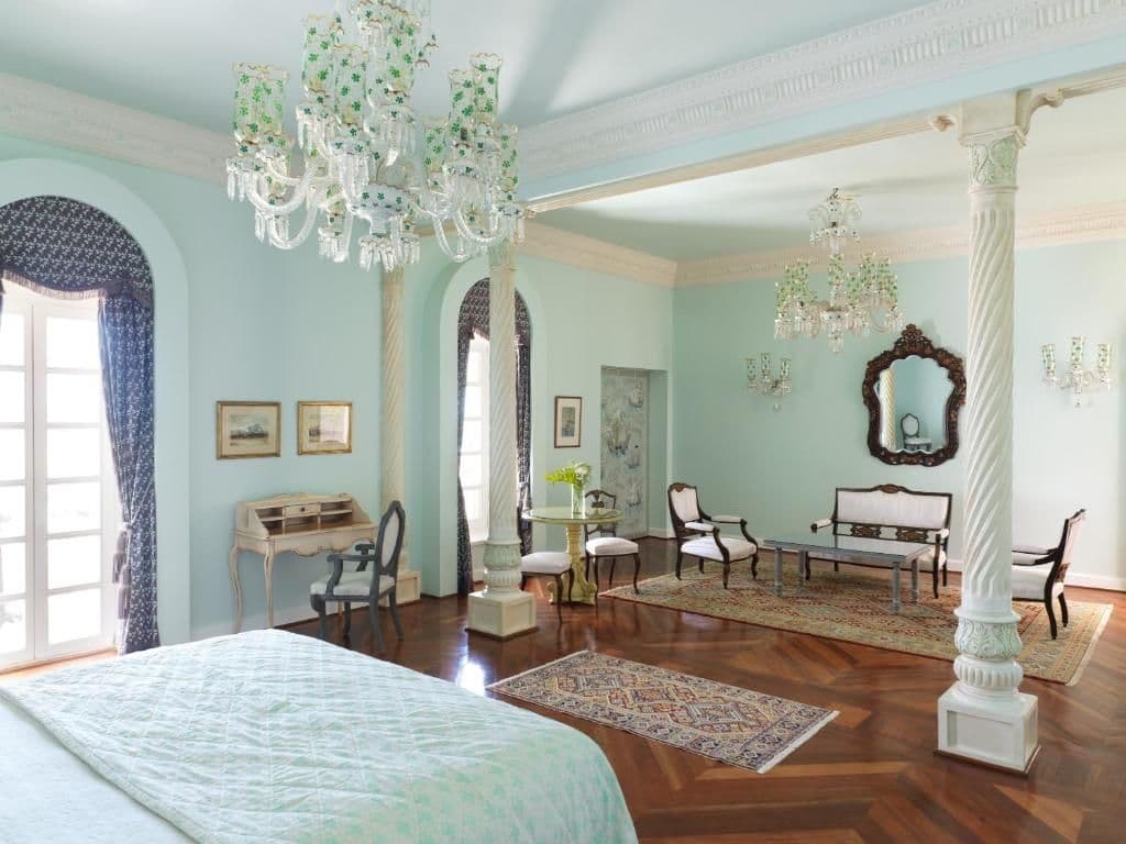 Soft pastel tones and Mediterranean influences define the architectural language of La Maison Bleue.