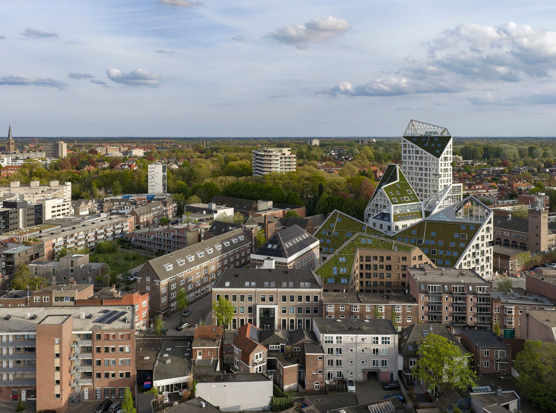 Nieuw Bergen brings 237 homes, historic structures and a distinctive sloping roofscape to Eindhoven.