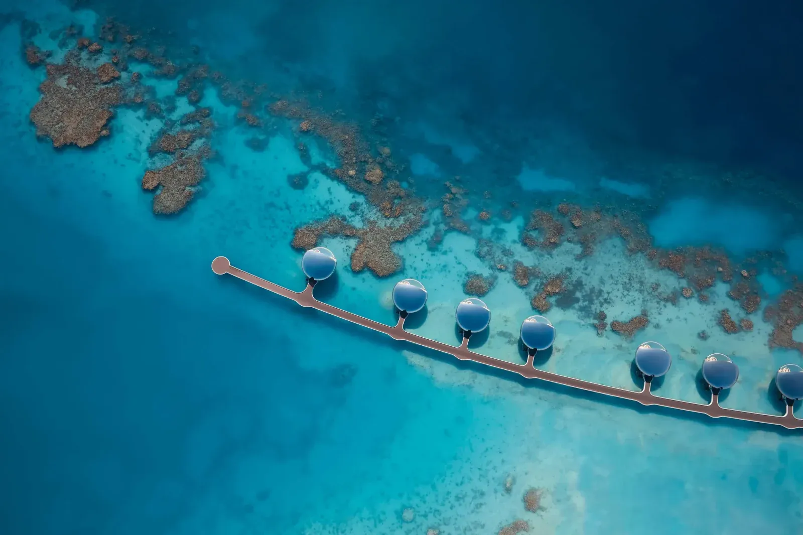 The resort’s polished spherical villas form a futuristic silhouette across Sheybarah Island.