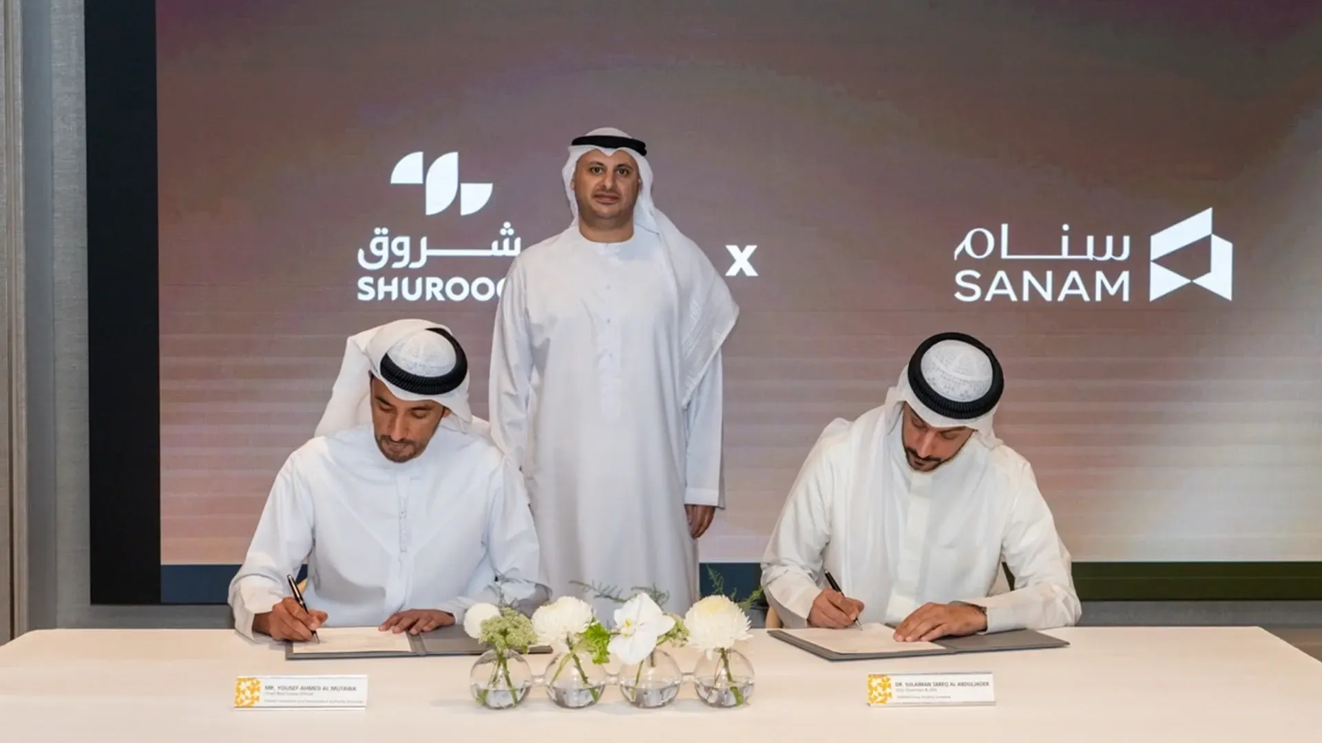 Yousif Al Mutawa and Dr Sulaiman Tareq Al Abduljader during the signing ceremony for the new American curriculum K-12 school at Sharjah Sustainable City, in the presence of Ahmed Obaid Al Qaseer, CEO of Shurooq.