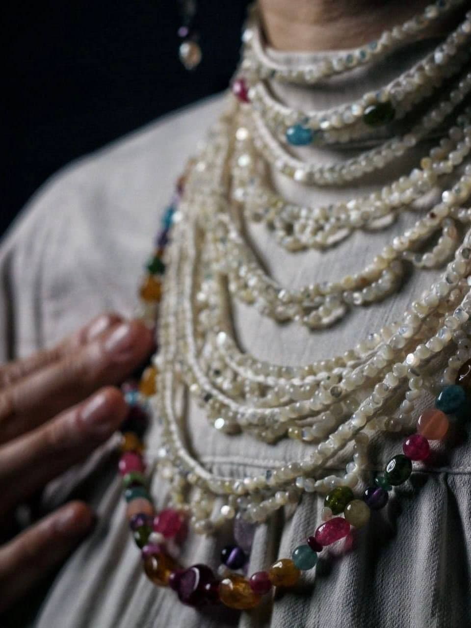 Natalia Shvalova’s pearl ornaments created using the traditional sazhenie po beli embroidery technique.