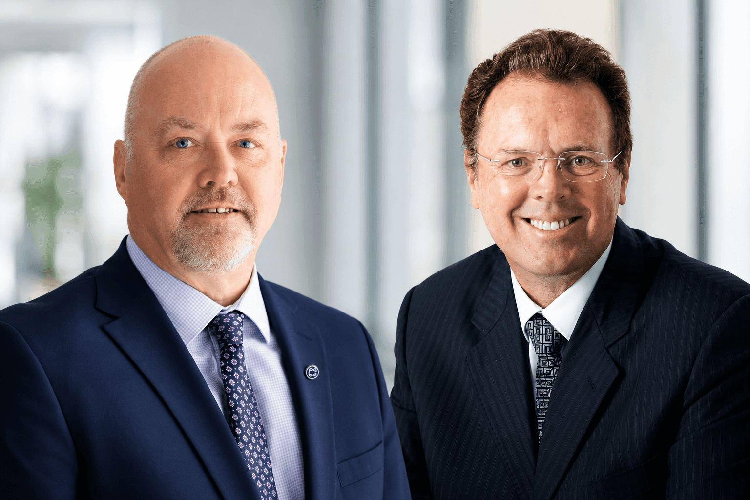  Nick Witty, Group CEO, Cavendish Maxwell (left) and Peter Goddard, CEO, TRI Consulting.