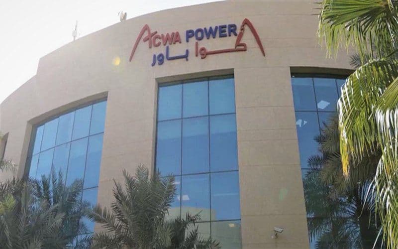 Exterior of an ACWA Power office building with the company's English and Arabic signage, the developer that will own 40% of the Hassyan desalination project