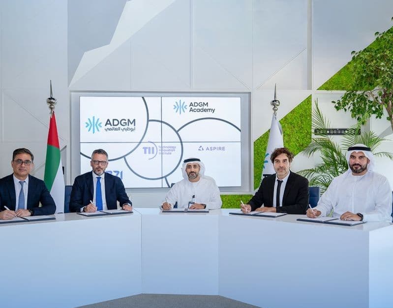 Agreement signing between ADGM, ADGMA, TII, Hub71, and ASPIRE. 