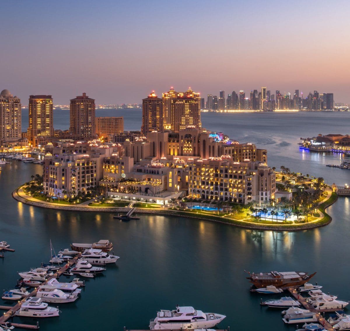 Marsa Arabia Island at The Pearl Qatar at dusk, where Alfardan Properties offers a 17-year lease-to-own programme at The Residences at The St Regis