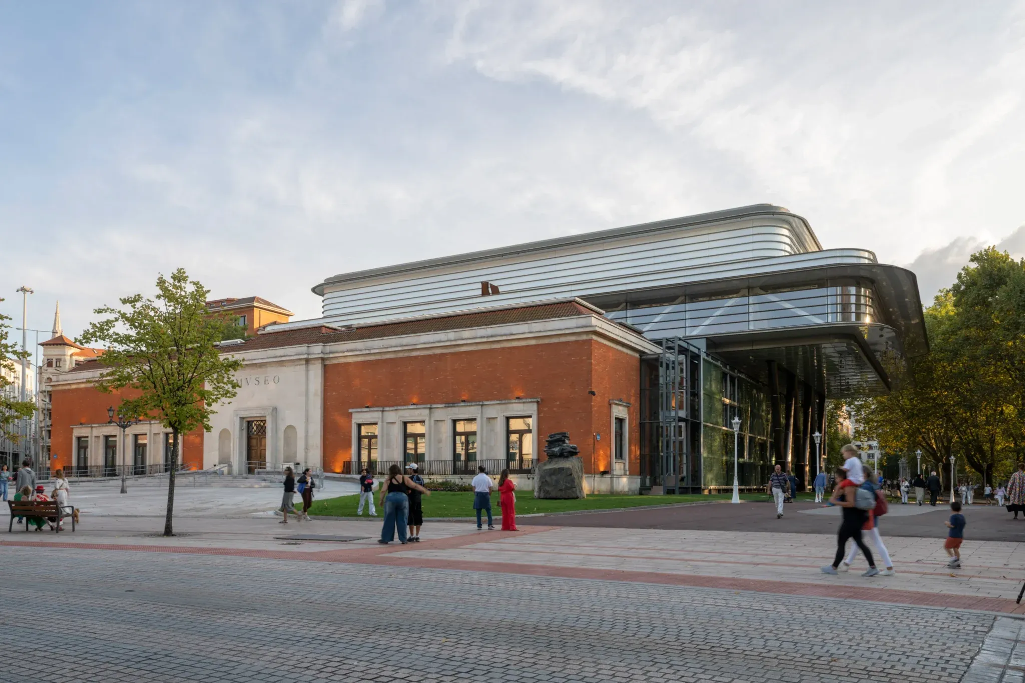 The Agravitas expansion rises behind the museum’s historic building.
