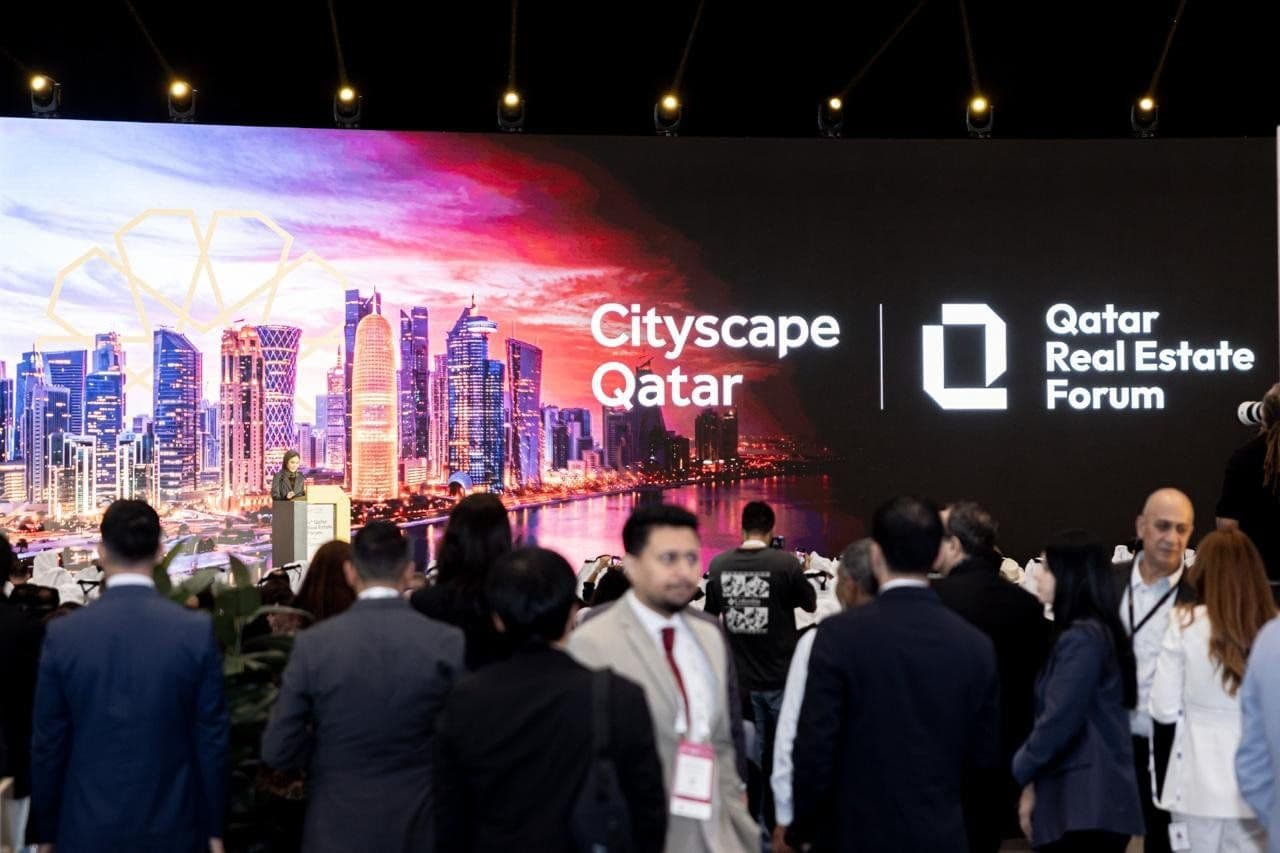 Delegates in front of the Cityscape Qatar and Qatar Real Estate Forum stage at the Doha Exhibition and Convention Center