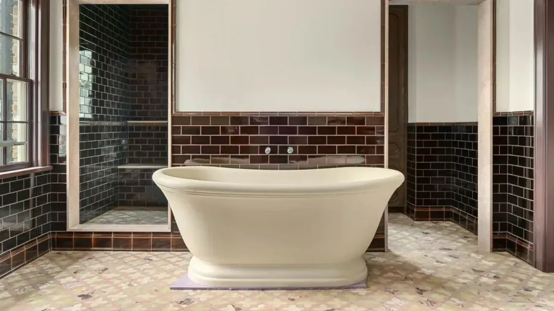 A bathroom featuring a luxurious freestanding bathtub