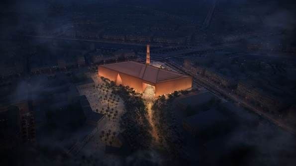 At night, The Grand Mosque becomes a beacon along the boulevard.