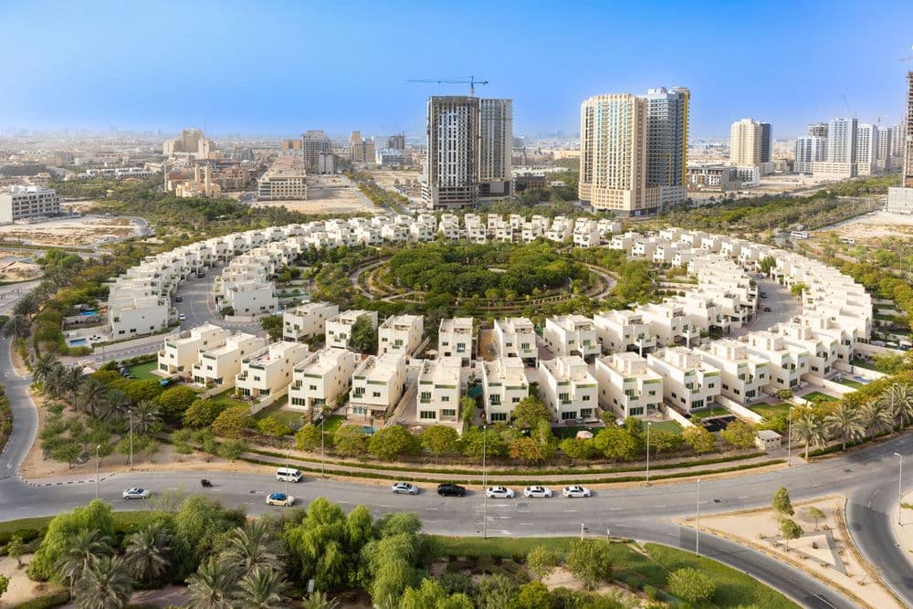 Aerial view of town house villa community in Jumeirah village circle Dubai