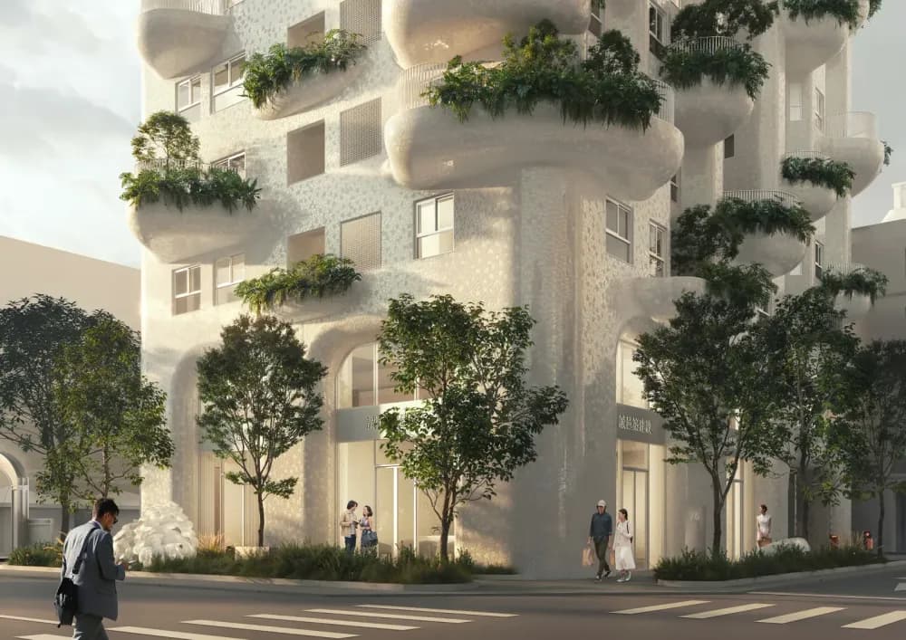 Communal terraces and planted balconies create a nature-filled residential experience in Taichung.