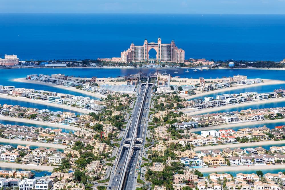 Dubai The Palm Jumeirah with Atlantis Hotel artificial island from above luxury.