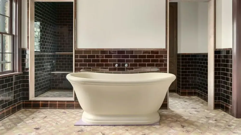 A bathroom featuring a luxurious freestanding bathtub