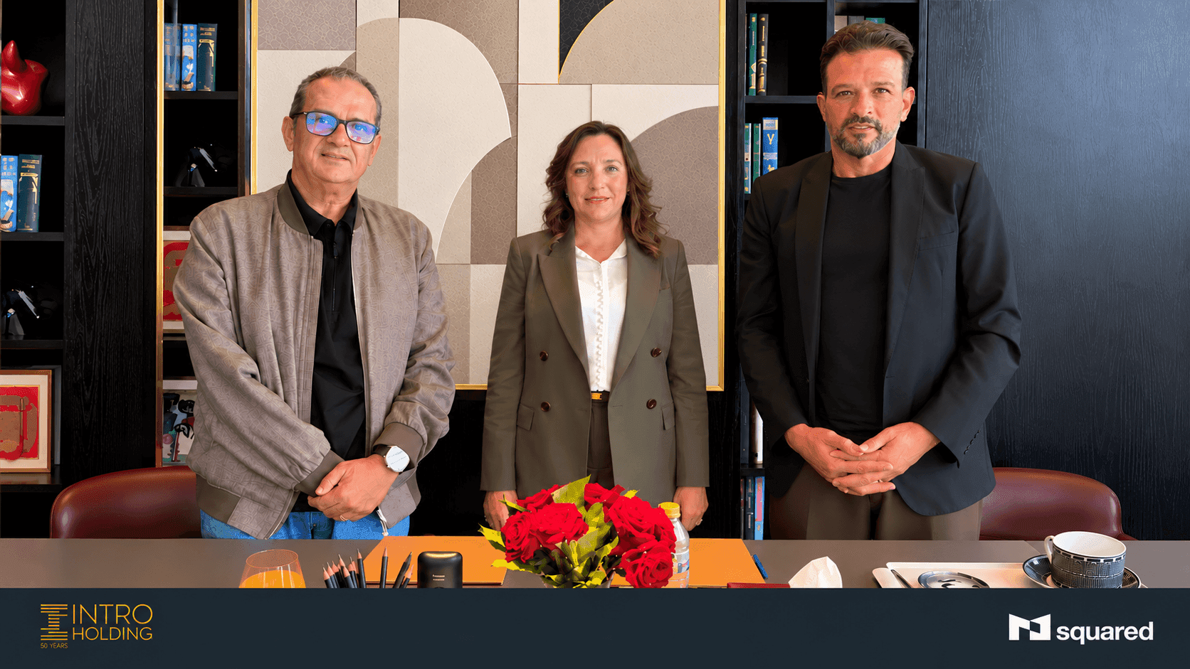 Intro Holding and M squared representatives with Mona El Helw following the partnership and management agreement.