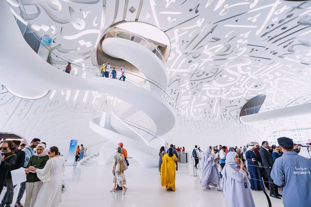 Visitors explore the DNA-inspired spiral staircase inside Dubai’s Museum of the Future.