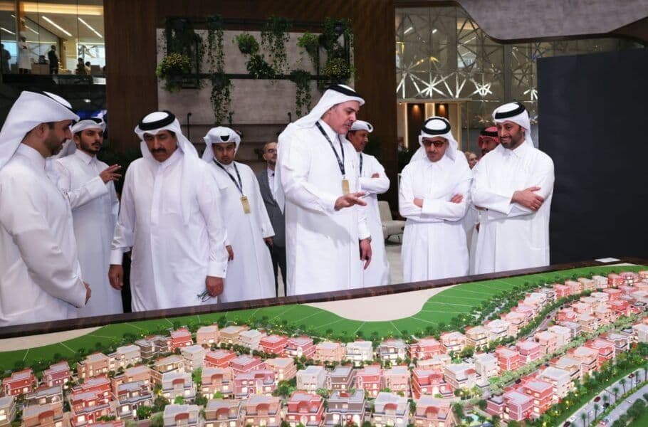 Visitors look over the Perlita Gardens masterplan model at UDC's stand, where Phase One sales of the villas have opened