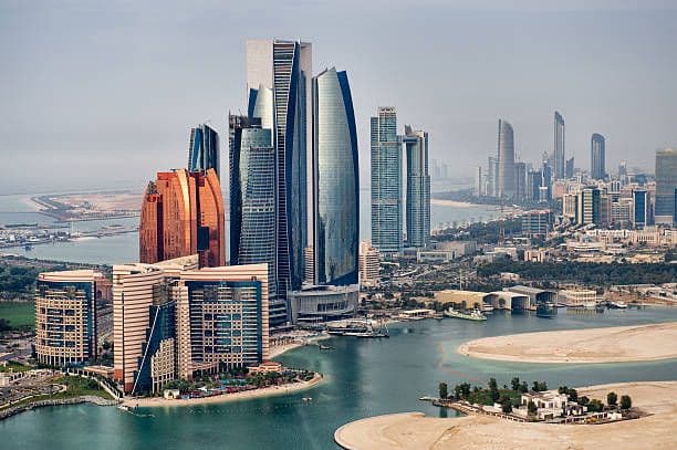 Abu Dhabi’s skyline. The emirate climbed eight places to 33rd in JLL’s 2026 Global Real Estate Transparency Index. Photo: iStock.