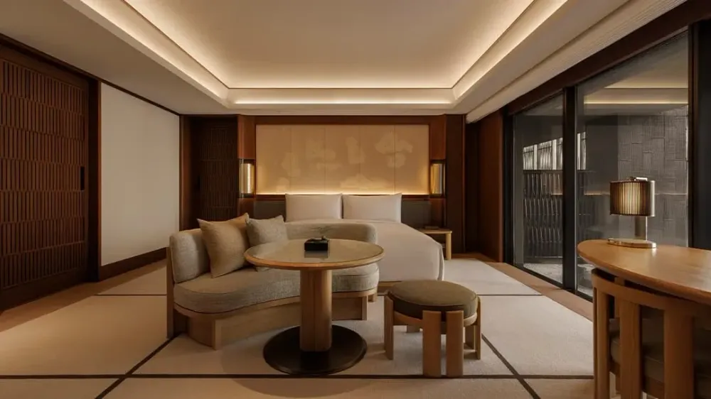 Capella Kyoto Hotel by Kengo Kuma & Associates draws on Kyoto’s machiya heritage through layered timber, filtered light and intimate spatial transitions.